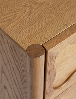 Close up view of the Fontaine wavy detailing solid oak 6-drawer dresser by Aimee Song