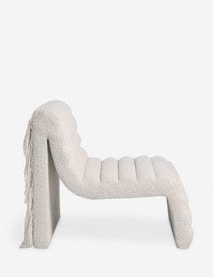 Side profile of the Leon textural boucle channel tufted armless accent chair by Carly Cushnie.