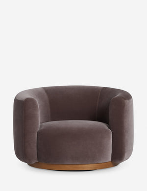 Lowry rounded silhouette velvet accent chair.