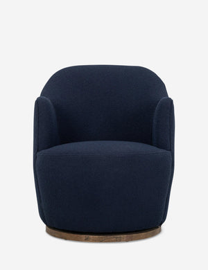 Margie rounded barrel swivel accent chair in navy