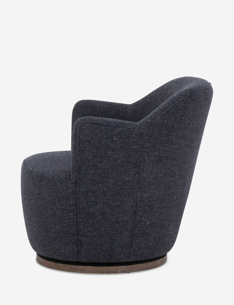 #color::slate | Side view of Margie rounded barrel swivel accent chair in slate