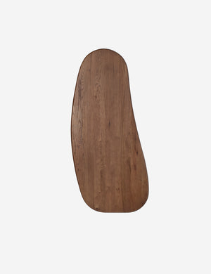 Overhead view of the Nave modern sculptural red oak dining table by Aimee Song