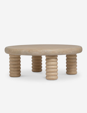 Sula round light wash coffee table