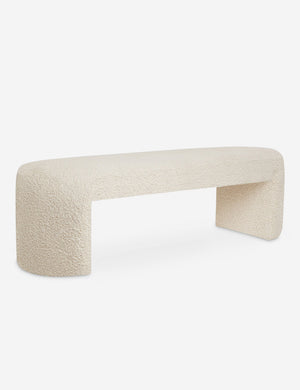 Angled view of the Mikhail cream boucle foam-padded bench.