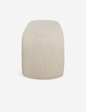 Side view of the Mikhail cream boucle foam-padded bench.