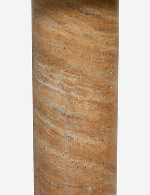 Close up of the Mona round stone drink table.