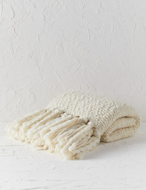 Olema ivory handwoven throw with fringed ends