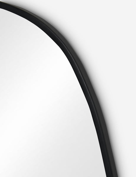 #color::black #size::small | Close up view of the Puddle slim frame wall mirror in charcoal