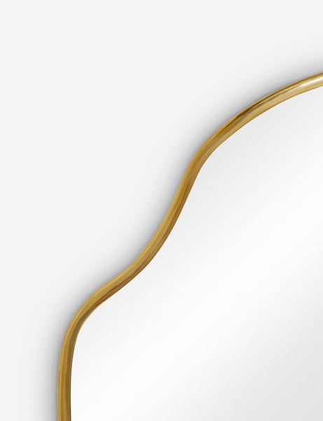 #color::gold  #size::small | The gold curved frame on the small puddle mirror