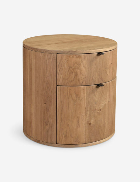 #color::natural | Angled view of the Kono 2-drawer round oak nightstand.