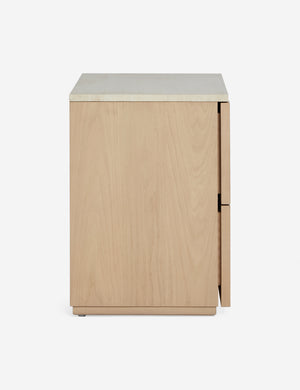 Side profile of the Rayner carved linear detailing oak two drawer nightstand.