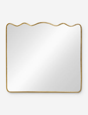 Rook mantel mirror with a gold frame and a wavy silhouette by Sarah Sherman Samuel