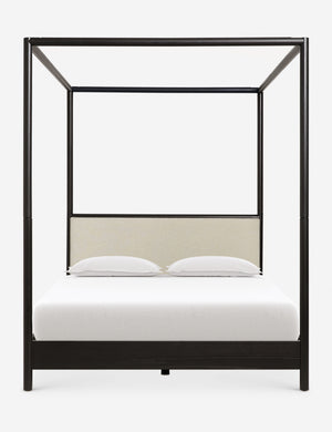 Simonette black canopy bed with upholstered headboard