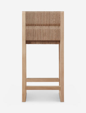 Back of the Maritza armless light wood and woven seagrass coastal style counter stool.