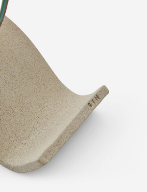 Close up view of the round Wavee Table Mirror by SIN Ceramics