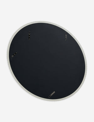 Back of the Whitaker white asymmetrical oval wall mirror.