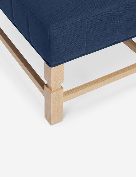 #color::dark-blue | The vertical channeling on the cushion of the Ambleside Dark Blue linen bench