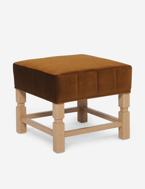 Angled view of the Ambleside cognac velvet ottoman