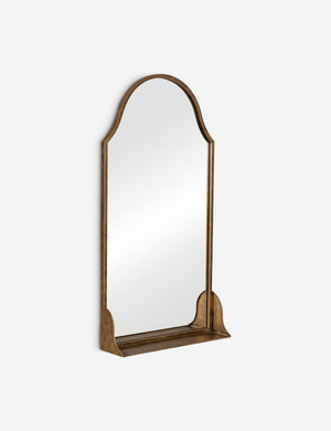 Angled view of the Clare arched wall mirror with shelf