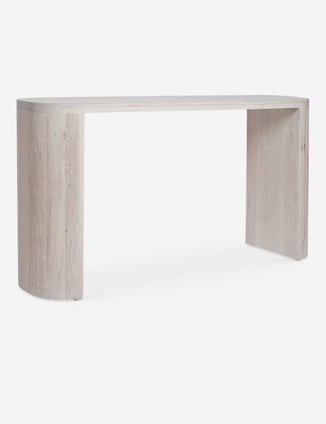 #color::washed-oak | Angled view of the Luna white-washed oak oval console table.