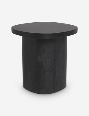 Angled view of the Luna black wood round side table