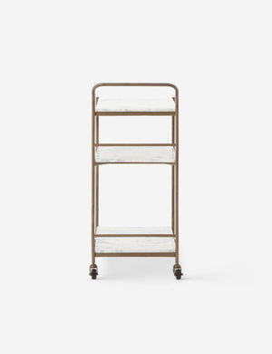 Side view of the Evander brass frame and white marble bar cart.