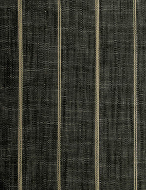 Close-up of the peppercorn stripe linen fabric on the Clementine platform bed