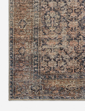 Corner shot of the Billie Rug in ink and salmon by Amber Lewis x Loloi