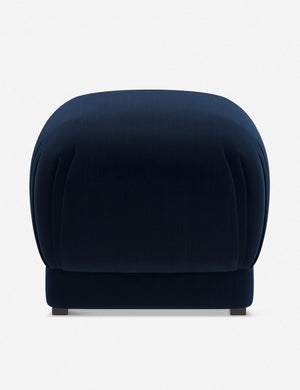Bailee Navy Velvet upholstered ottoman with a pouf-like design and pleated corners