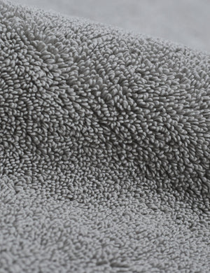 Detailed shot of the Cloud loom sustainable light gray bath mat by coyuchi