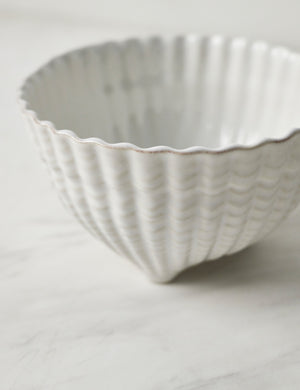 Close-up of the Aparte white footed bowl with shell inspired design by Costa Nova