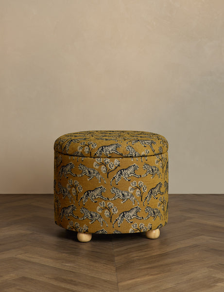 #showall::40349807607907 | Kamila tiger golden round 24 inch ottoman with storage space and pinewood feet by Sarah Sherman Samuel sits in a studio room