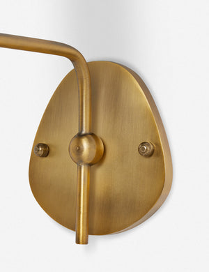 Close up of the wall mount of the Magdalene brass single sconce