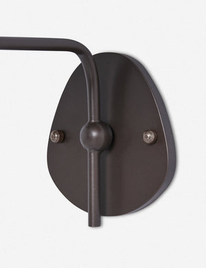 Close up of the wall mount of the Magdalene black single sconce