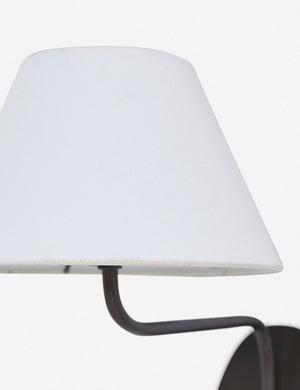 Close up of the Magdalene black single sconce