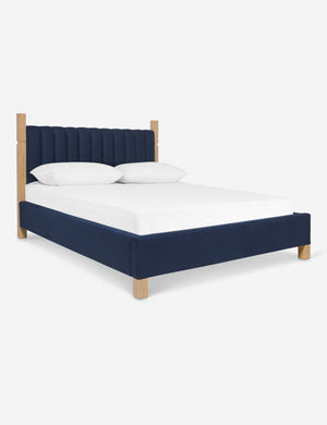 Angled view of the Ambleside dark blue velvet bed