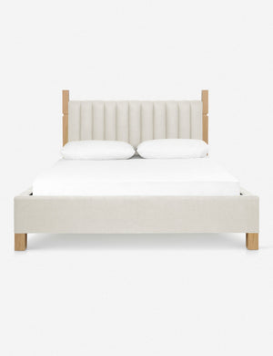 Ambleside Natural Linen upholstered bed with a wood-post bed frame and a headboard with vertical channeling by Ginny Macdonald