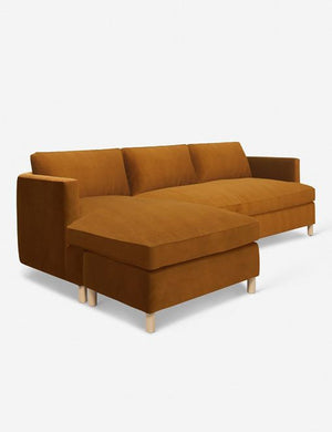 Angled view of the Belmont cognac velvet left-facing sectional sofa