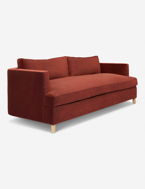 Angled view of the Paprika Velvet Belmont Sofa