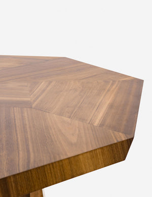 The beveled edge on the side of the Herschel dining table