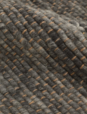 The handwoven all-natural fiber jute construction of the Khloe charcoal rug
