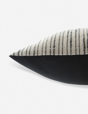 Side view of the Peregrine black and white marled striped lumbar pillow