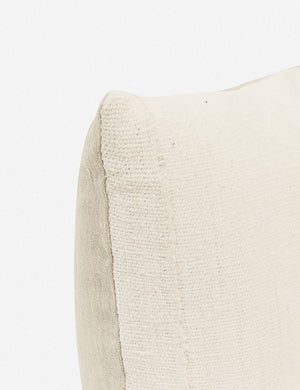 The corner of the Norala solid white handmade lumbar throw pillow