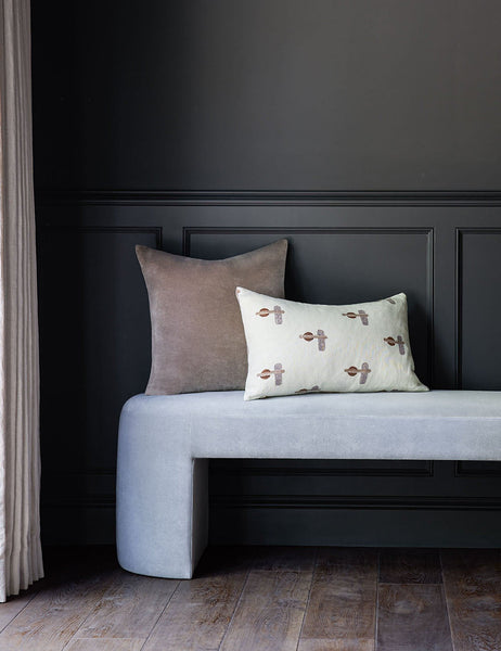 #color::warm-gray #style::square  #fill type::with-feather-down-insert  #fill type::pillow-cover-only |   Charlotte warm gray square velvet pillow sits atop an ice blue velvet bench