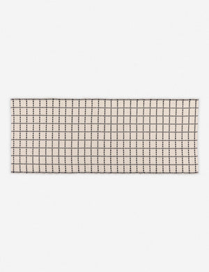 Sebou natural and black dotted machine washable mat in its runner size