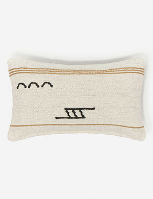 Iconic ivory stripe lumbar pillow with orange stripes and black symbols by Sarah Sherman Samuel