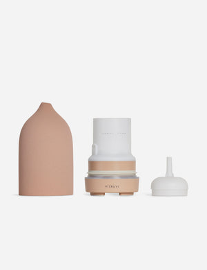 The three components of the suede pink Stone Diffuser by Vitruvi
