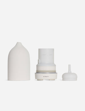 The three components of the white Stone Diffuser by Vitruvi