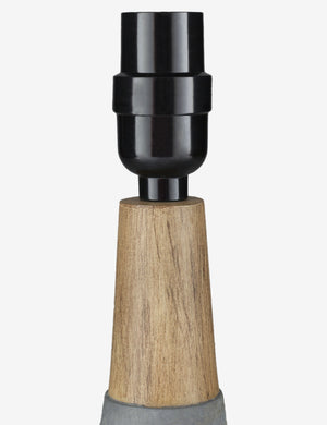 Close-up of the light fixture on the Marcella gray vase-shaped Mini Table Lamp with ceramic base