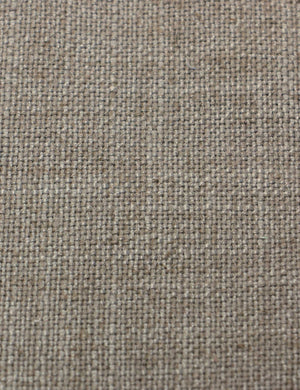 Detailed shot of the navy linen on the Adara light gray linen upholstered bed.